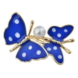 Zlatě lemovaná brož dvou modrých motýlů s perlou JZPI0072 obraz