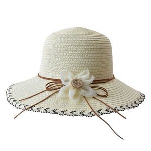 Béžový sluneční dámský klobouk s květinou JZHA0089BE obraz