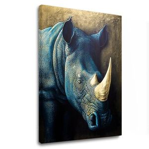 Zlatý dotek na brnění nosorožce ze savany obraz