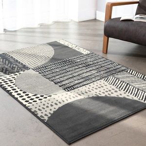 Dekorativní koberec s geometrickým vzorem obraz