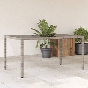 Zahradní stůl se skleněnou deskou šedý 150x90x75 cm polyratan obraz