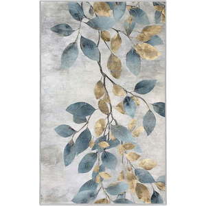 Pratelný koberec ve světle modré a zlaté barvě 120x180 cm Golden Leaves – Mila Home obraz