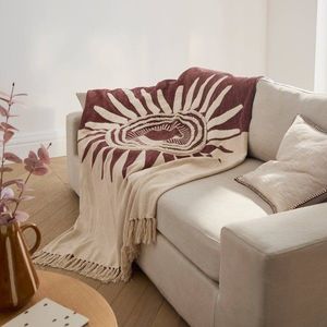 Pléd s texturovaným efektem a motivem slunce obraz