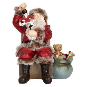 Červená dekorace Santa Claus s Louskáčkem v ruce a hračkami - 16*13*19 cm 6PR5749 obraz