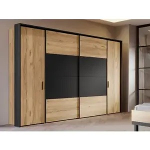 Šatní skříň Dalate 270 cm, dub catania/černá obraz